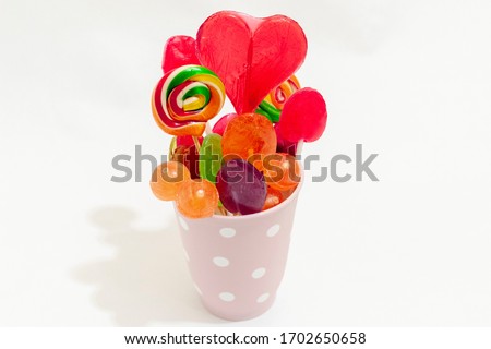 Colorful lollipop on white background. Still life photo. 