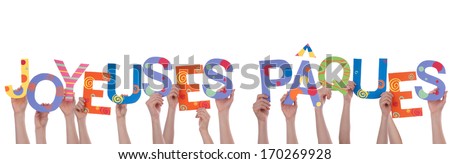Many Hands Holding the Colorful French Words Joyeuses Paques, Which Means Happy Easter, Isolated
