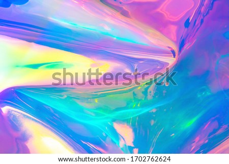 Blurred texture in violet, pink and mint colors. Abstract trendy holographic background in 80s style. Synthwave. Vaporwave style. Retrowave, retro futurism, webpunk