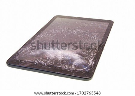 Tablet with broken screen glass isolated over white