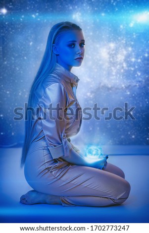 Stock Photo - Mysterious girl of space world. Art photo