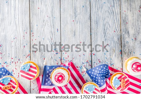 Independence Day July 4 congratulations background. Veterans Day. American Constitution holiday. USA American tradition greeting card. Patriotic home cupcakes with americas symbols decor
