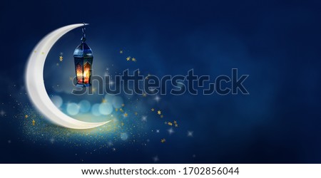 Ramadan Kareem background banner. Islamic Greeting Cards for Muslim Holidays and Ramadan. Blue banner with moon and lantern. Royalty-Free Stock Photo #1702856044