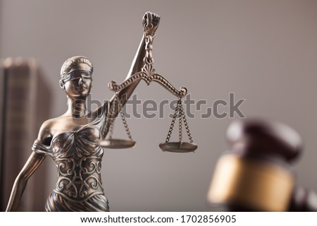 Law concept, Scales sculpture and wooden gavel