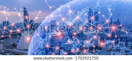 Wireless Network City concept, with line connecting together, modernize an internet of things era connecting everything in city background of metropolis city urbanize Royalty-Free Stock Photo #1702921750