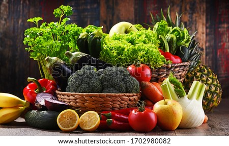 Composition with assorted organic vegetables and fruits. Royalty-Free Stock Photo #1702980082