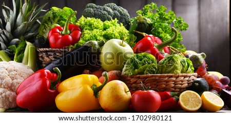 Composition with assorted organic vegetables and fruits. Royalty-Free Stock Photo #1702980121