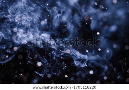 smoke fume and snow flash glow, bright blurr motion during night  Royalty-Free Stock Photo #1703118220