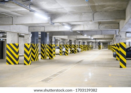 Underground parking, black yellow, cars