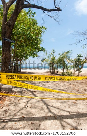Beach access closed with police tape during Covid-19