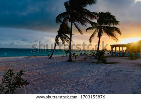 sunset beach Rendezvous Bay Anguilla island Caribbean Royalty-Free Stock Photo #1703155876