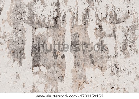 broken concrete wall painted white