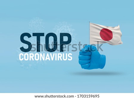COVID-19 Visual concept - hand-text Stop Coronavirus, hand-gesture versus virus infection, clenched fist holds flag of Japan. Pandemic 3D illustration.