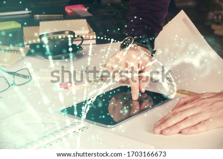 Double exposure of man's hands holding and using a phone and DNA drawing. Medical education concept.