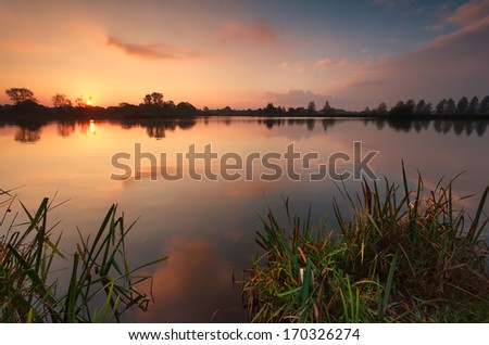 gold sunrise over lake, Drenthe, Netherlands