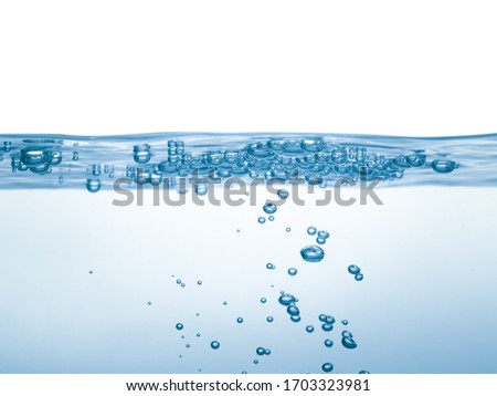 Clear water waves and air bubbles isolated over white background. Royalty-Free Stock Photo #1703323981