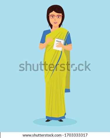 Indian Teacher in yellow saree with English book in hand