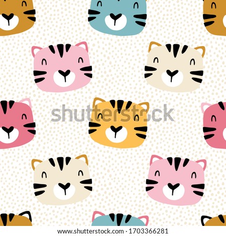 Tiger kitten with polka dots. Seamless pattern with cute animals faces. Childish print for nursery in a Scandinavian style. For baby clothes, packaging. Vector cartoon illustration in pastel colors.