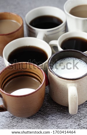 
Aerial view of various coffee on concrete.
