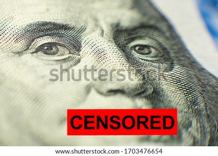 Benjamin Franklin portrait from a banknote with a closed mouth a red plaque with a caption print CENSORED. The concept of censorship for money, corruption, bribery of a witness