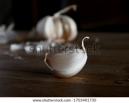 Garlic (Allium sativum. Ingredients for seasoning that are often used for cooking especially Indonesian and other Asian countries. Note; picture of unpeeled garlic.