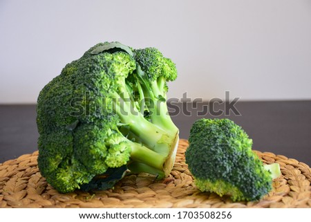 
fresh broccoli on brown background