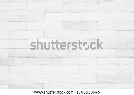 Wall white brick wall texture background. Brickwork or stonework flooring interior rock old pattern clean concrete grid uneven bricks design stack. 