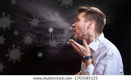 Man is coughing trying to cover his mouth.  Influenza, cold, flu, coronavirus. Infection through an airborne droplet. Droplets of saliva, water and viruses. Cough and sneeze. Man 30-40 aged Royalty-Free Stock Photo #1703585125