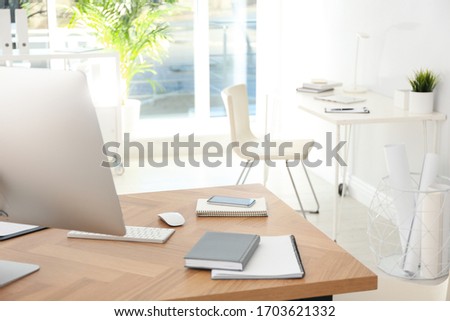 Computer on desk in modern office. Comfortable workplace