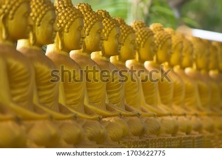 Golden buddhas in the Asia