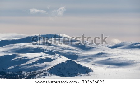 Winter landscape in Dovrefjell-Sunndalsfjella National Park, Norway Royalty-Free Stock Photo #1703636893