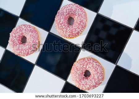 glazed donuts and squared background