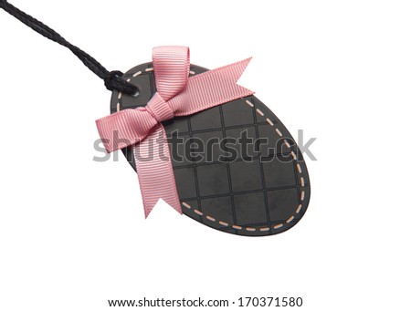 Black price tag or address label with beautiful pink bow.