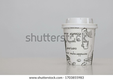 Coffee to go on a white background
