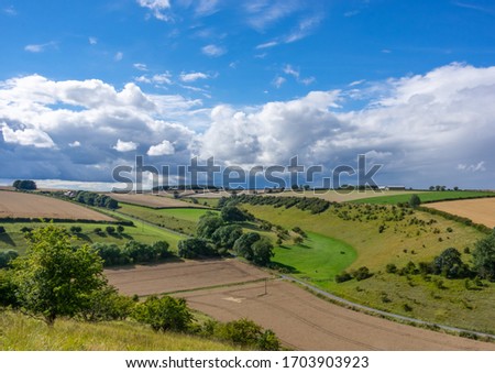 View of the rolling hills and big sky of the Yorkshire Wolds near Thixendale.