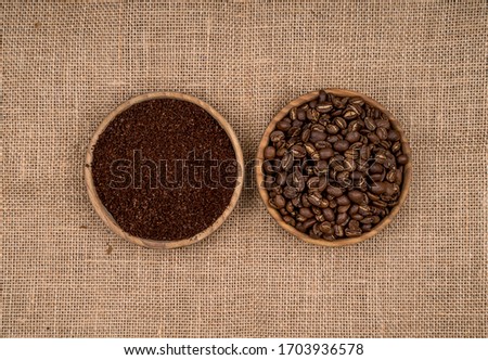 Ground coffee and coffee beans in bowl