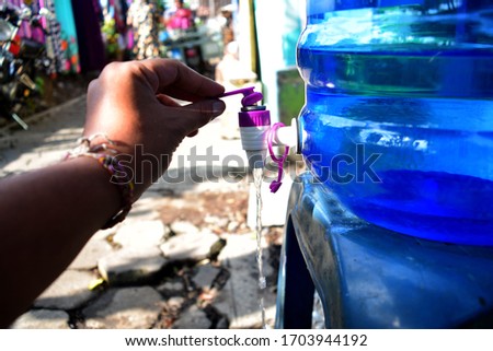 Close up plastic faucets for drinking water dispensers. blur background