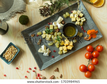 slicing cheeses, assorted in a restaurant photo from above