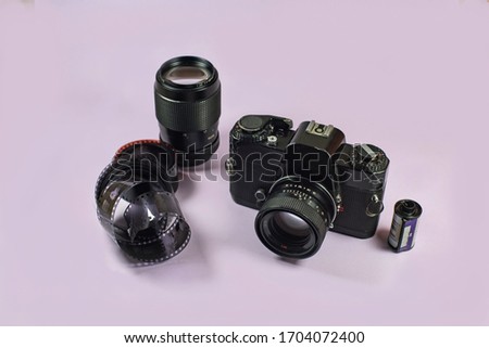 Vintage cameras in color background