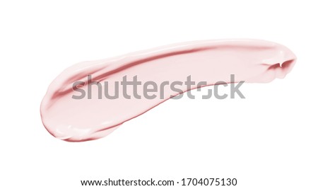 Pink cosmetic cream smear isolated on white background. Peach color beauty creme swipe. Skin care product creamy texture. Color correcting makeup primer smudge swatch Royalty-Free Stock Photo #1704075130