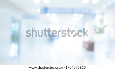 Abstract blur luxury hospital hall. Blur clinic corridor interior background with defocused effect. Healthcare and medical concept