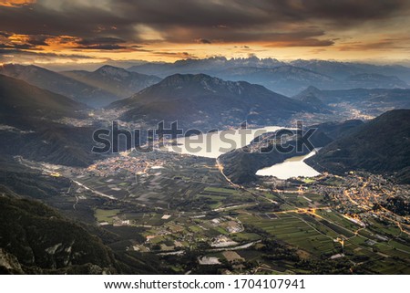 two lakes and a beautiful sunset from the top of a mountain, in the dolomites, Northern italy.