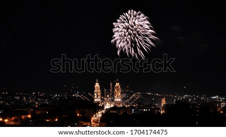 Fireworks and a church in the night