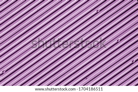 Metal plate wall in purple tone. Abstract architectural background and texture for design.