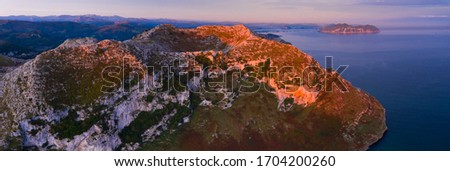 Aerial view of Mount Candina peak in Sonabia village within Castro Urdiales Municipality at the Eastern Coastal Mountain Range of Cantabria in Spain