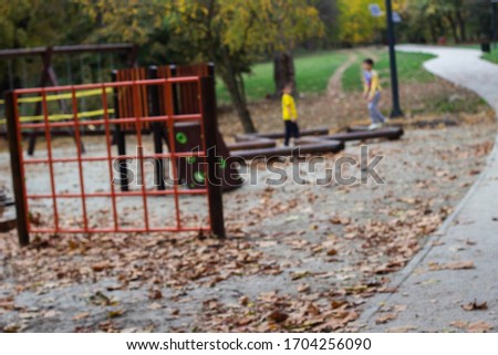 Defocused and blur image of children's playground at public park 