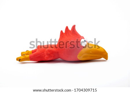 Funny Squeaky Dog Toy on white background Royalty-Free Stock Photo #1704309715