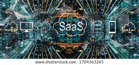 SaaS - software as a service concept with abstract Tokyo night cityscape