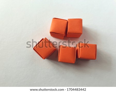 Small paper boxes on white background.  Origami boxes