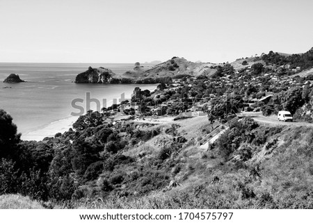 New Zealand - scenic view of Coromandel Peninsula. The town of Hahei. Black and white vintage style.